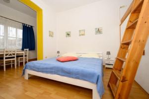 Una cama o camas en una habitación de Villa Christiana - Stranddistel