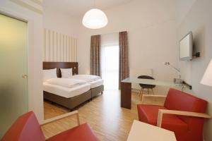 Postel nebo postele na pokoji v ubytování Seehörnle Bio Hotel & Gasthaus