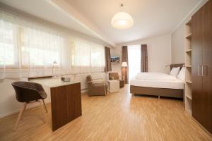Postel nebo postele na pokoji v ubytování Seehörnle Bio Hotel & Gasthaus