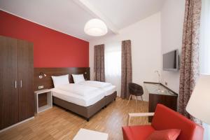 Postel nebo postele na pokoji v ubytování Seehörnle Bio Hotel & Gasthaus