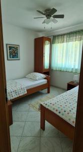 Postel nebo postele na pokoji v ubytování House More
