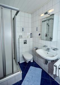 A bathroom at Ferienwohnung Leitges
