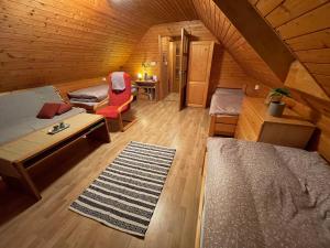A bed or beds in a room at Apartmán na hranici