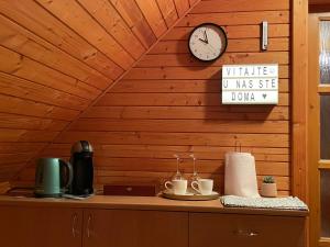 Coffee and tea making facilities at Apartmán na hranici
