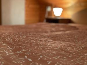 A bed or beds in a room at Apartmán na hranici