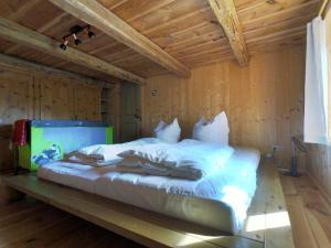 Säng eller sängar i ett rum på Biohof Neihausmo