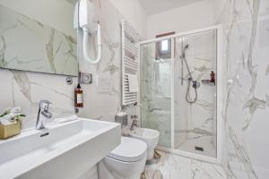 Koupelna v ubytování Hotel Nuovo Teson