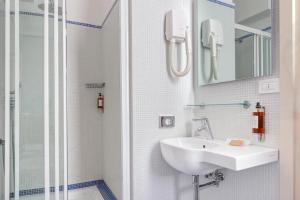Koupelna v ubytování Hotel Nuovo Teson