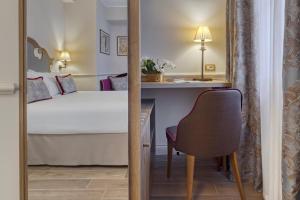Postel nebo postele na pokoji v ubytování Hotel Nuovo Teson