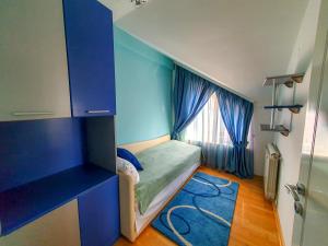 Ένα ή περισσότερα κρεβάτια σε δωμάτιο στο Lux Villa Mitimago