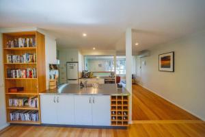 a kitchen with a large island in a room at 150 Steps FREE WI-FI in Apollo Bay