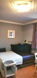 
Ein Bett oder Betten in einem Zimmer der Unterkunft Ferienwohnung Milan
