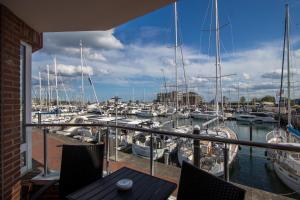 a view of a marina with boats in the water at ancora Marina Haus 1 Nr 04, Typ 2 in Neustadt in Holstein