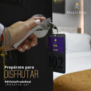 תעודה, פרס, שלט או מסמך אחר המוצג ב-Hotel Prado Real