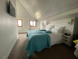 Postelja oz. postelje v sobi nastanitve Auberge de Confignon