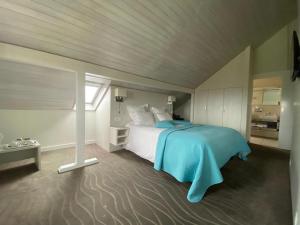 Postelja oz. postelje v sobi nastanitve Auberge de Confignon