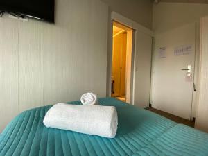 Postelja oz. postelje v sobi nastanitve Auberge de Confignon