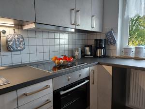 Virtuvė arba virtuvėlė apgyvendinimo įstaigoje Ferienwohnung Rothaarsteig in Winterberg-Neuastenberg