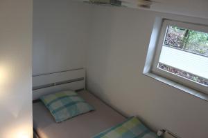 Giường trong phòng chung tại Hasen Apartment Lingen