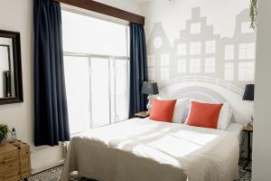 Aris Amsterdam客房内的一张或多张床位