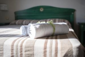 A bed or beds in a room at Le Vanille