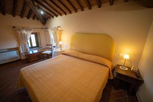 Postel nebo postele na pokoji v ubytování Cavarchino B&B