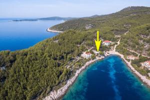 an aerial view of a resort on the shore of a lake at Guesthouse Karbuni (217) in Blato