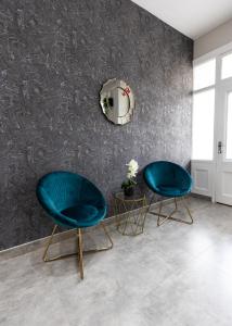 Posezení v ubytování Luxe Suites Boutique Hotel