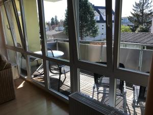 a view of a balcony from a window at Likedeeler Weg 1 Whg 21 in Zingst