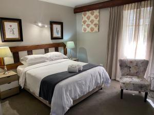 Ένα ή περισσότερα κρεβάτια σε δωμάτιο στο Oxford Lodge Vryheid +96 φωτογραφίες