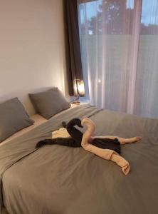 Säng eller sängar i ett rum på Le DiamanSter Francorchamps