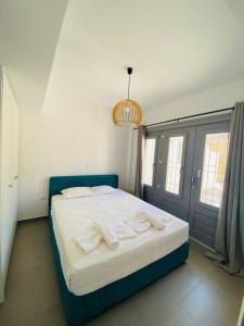 Posteľ alebo postele v izbe v ubytovaní Harma Villas