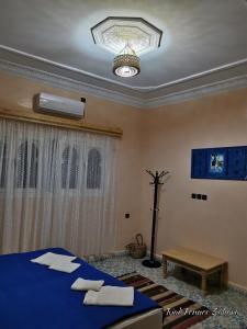 Voodi või voodid majutusasutuse Riad Fennec Sahara toas