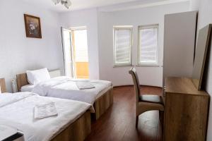 Postel nebo postele na pokoji v ubytování Hotel Park