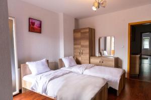 Postel nebo postele na pokoji v ubytování Hotel Park
