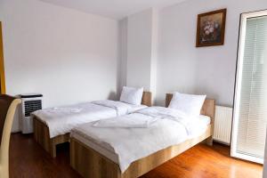 Postel nebo postele na pokoji v ubytování Hotel Park