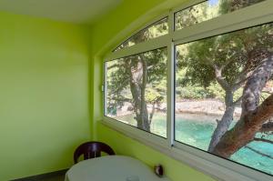 Vonkajšia záhrada v ubytovaní Seafront Apartments Olivera
