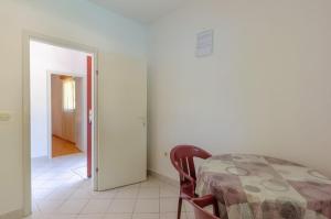 Posteľ alebo postele v izbe v ubytovaní Seafront Apartments Olivera