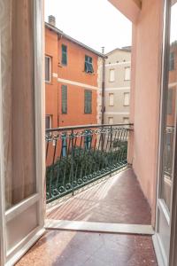 an open door to a balcony in a building at Il Mare fra gli Ulivi in Monterosso al Mare