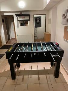 Herní místnost v ubytování Big Homebase with Billardtable