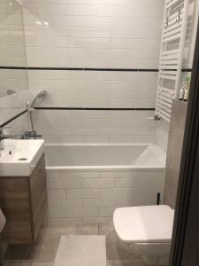 Kúpeľňa v ubytovaní apartament Śródmieście 1 sypialnia oraz 1 salon