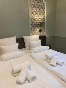 Posteľ alebo postele v izbe v ubytovaní Amber Boutique Hotels - Hotel Amber