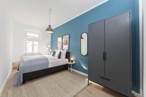 Ένα ή περισσότερα κρεβάτια σε δωμάτιο στο Limehome Dresden Jordanstraße