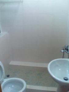 A bathroom at Oriental Pearl Budget Hotel