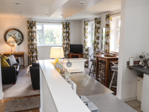 a kitchen and living room with a counter top at Riverview Apartment in Chester