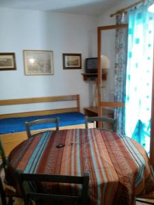 Łóżko lub łóżka w pokoju w obiekcie Villa Perla