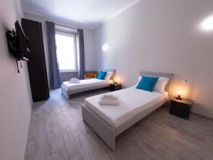 Posteľ alebo postele v izbe v ubytovaní The Best Rent - Apartment close to Termini Station