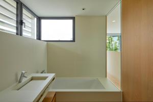 A bathroom at Holiday Rentals at Camiral Golf & Wellness