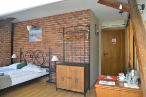 Posteľ alebo postele v izbe v ubytovaní Hotel Via Ironia