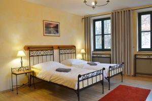 Posteľ alebo postele v izbe v ubytovaní Hotel Via Ironia